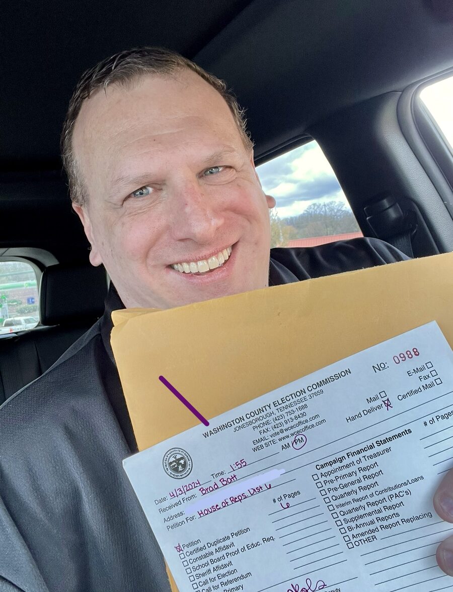 Brad Batt holding his petition to run for TN House District 6